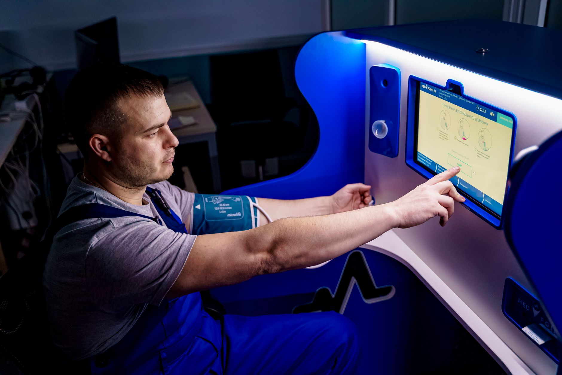 Person using a self-service health kiosk